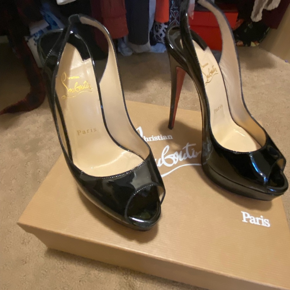 Christian Louboutin lady peep toe size 38. Worn twice. Sole protectors put on.
